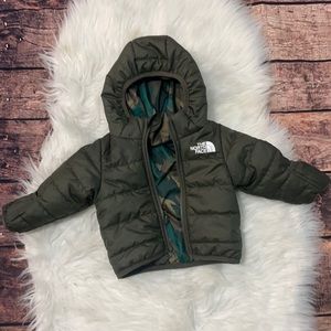 North face- baby jacket. 0-3 months REVERSIBLE green/camo print jacket.